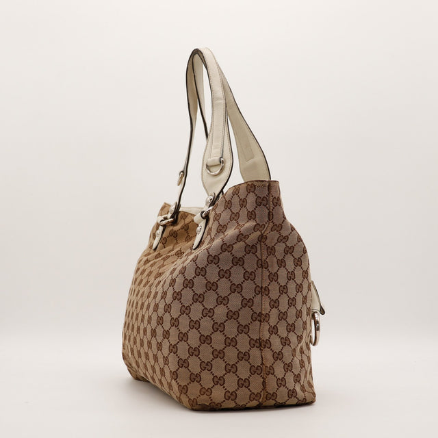 Vue de profil gauche Tote Horsebit Gucci toile GG Canvas occasion — AMANA Vintage