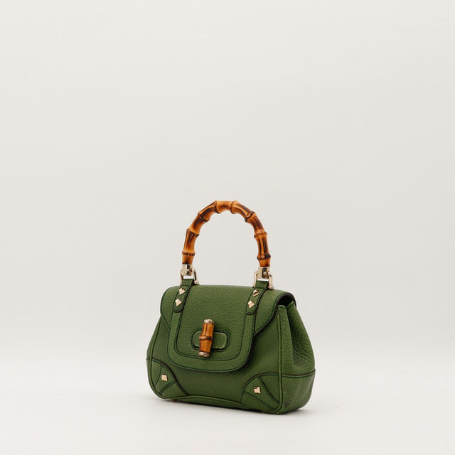 Vue trois quarts gauche sac Gucci cuir grené vert anse bambou occasion — AMANA Vintage
