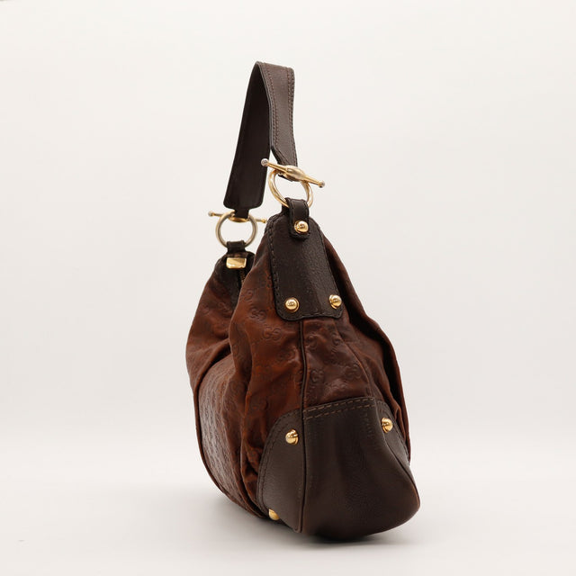 Vue de côté Gucci Hobo Guccissima cuir marron occasion — AMANA Vintage