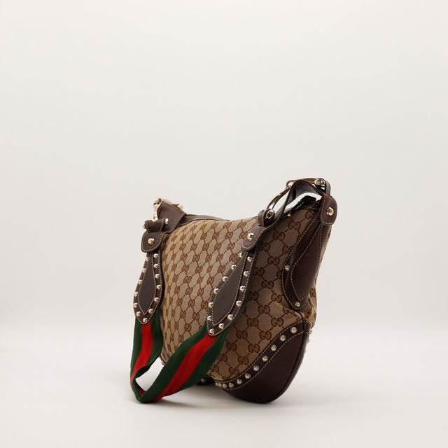 Sac Gucci Hobo Web vue de trois quarts profil gauche canvas GG clouté occasion — AMANA Vintage