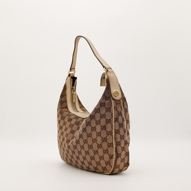 Sac Gucci Hobo GG canvas vue de trois quarts gauche occasion — AMANA Vintage