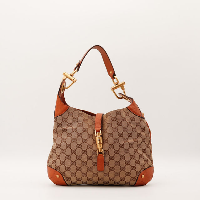 Sac Gucci New Jackie toile monogrammée cuir terracotta vue trois quarts occasion authentique — AMANA Vintage