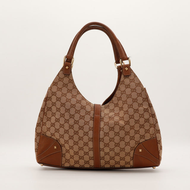 Sac Gucci New Jackie vue de trois quarts droit canvas GG beige — AMANA Vintage