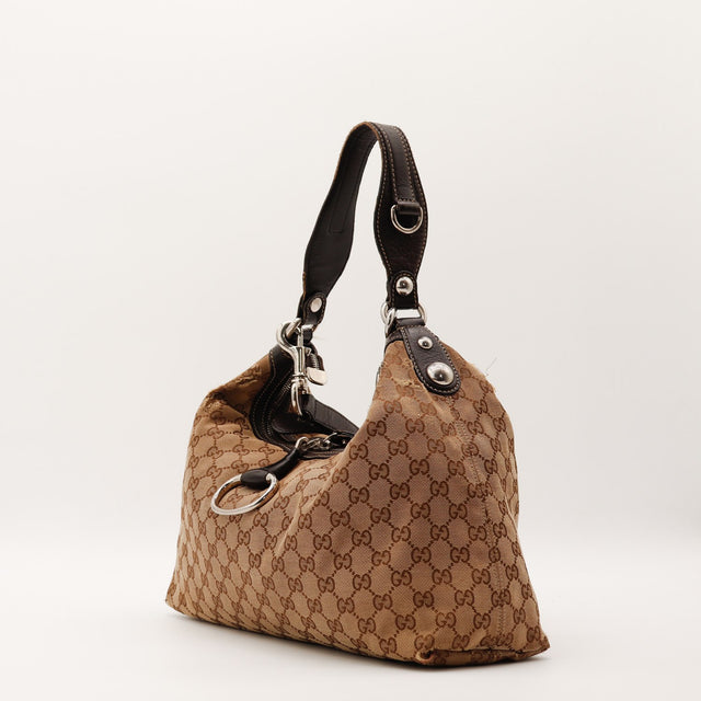 Profil gauche sac Gucci Hobo toile monogrammée cuir marron foncé — AMANA Vintage
