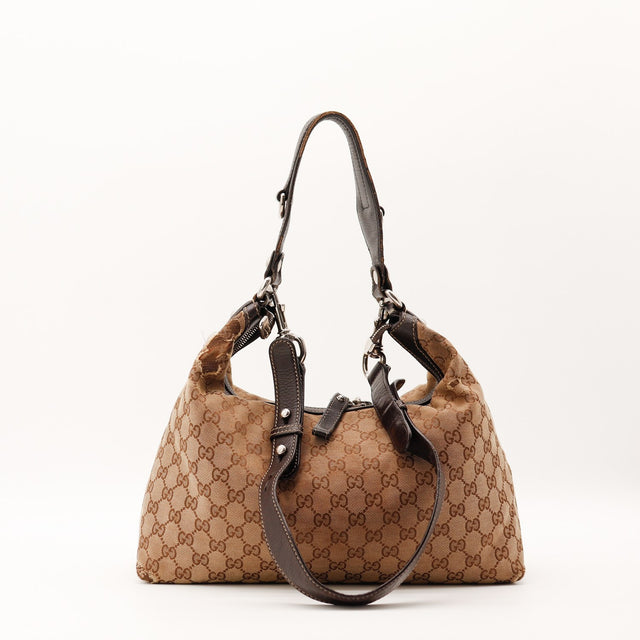 Vue de face sac Gucci Hobo toile monogrammée avec bandoulière réglable — AMANA Vintage
