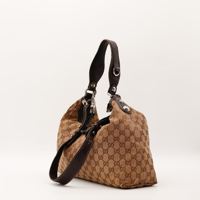 Profil droit sac Gucci Hobo toile monogrammée détail cuir marron — AMANA Vintage