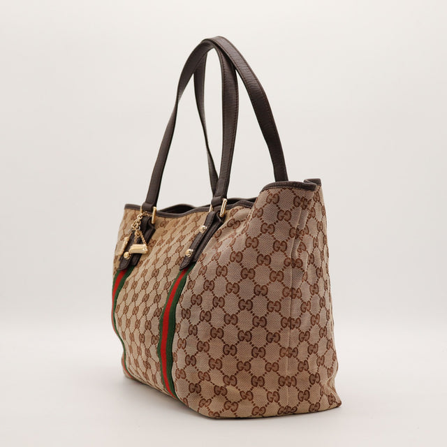 Tote Bag Bamboo Gucci vue de trois quarts gauche toile monogramme et cuir marron — AMANA Vintage