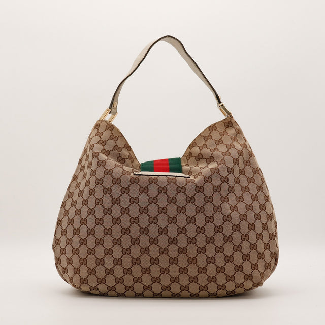 Gucci Hobo Web vue de profil droit toile GG cuir ivoire occasion — AMANA Vintage