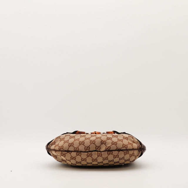 Détail fermoir bambou et métal doré Hobo Gucci — AMANA Vintage