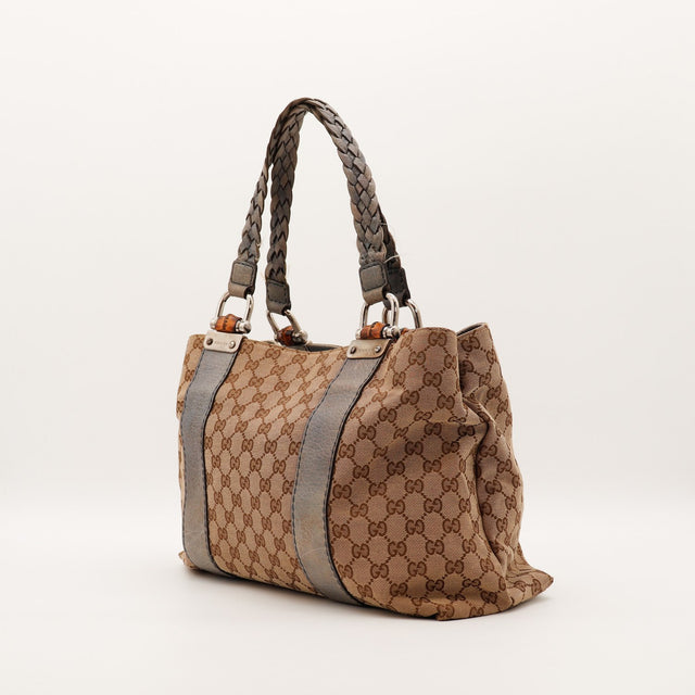Tote Bag Bambou Gucci vue de trois quarts côté gauche anses tressées décolorées — AMANA Vintage