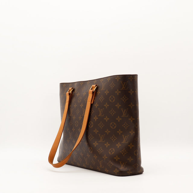 Louis Vuitton Luco vue de trois quarts côté droit anses vachette caramel — AMANA Vintage