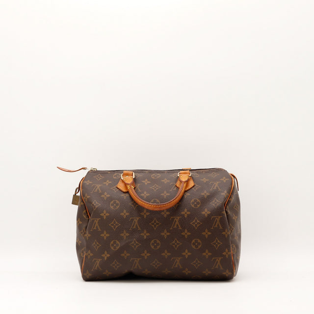 Coins avec frottements Louis Vuitton Speedy 30 toile Monogram — AMANA Vintage