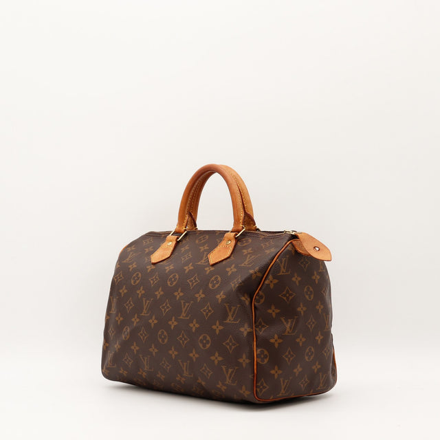 Détail cuir vachette patine caramel Louis Vuitton Speedy 30 — AMANA Vintage