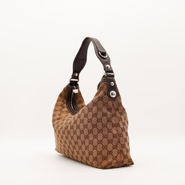 Vue de trois quarts arrière Hobo Gucci toile monogrammée cuir marron — AMANA Vintage