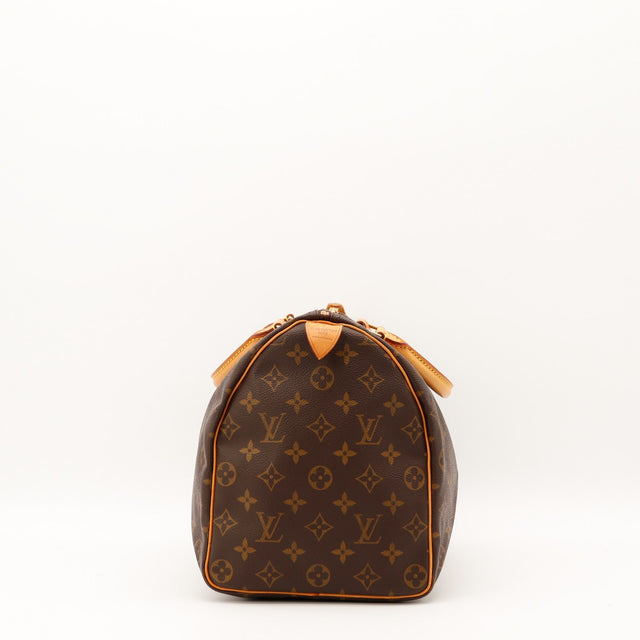 Coins et bords vachette Louis Vuitton Speedy 35 Monogram occasion authentique — AMANA Vintage
