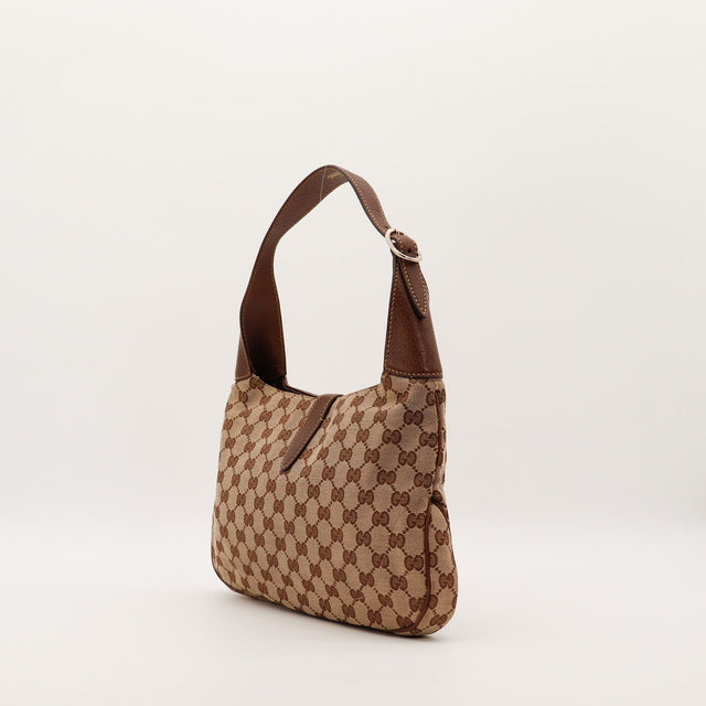 Gucci New Jackie vue de profil droit cuir grainé marron anse réglable — AMANA Vintage