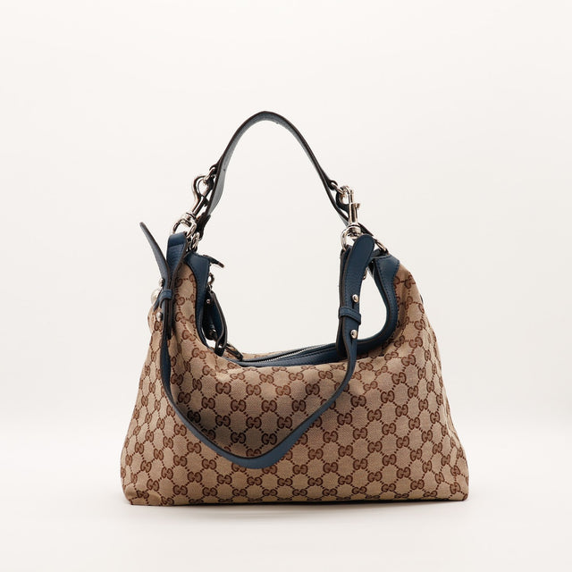 Hobo Gucci toile monogrammée vue de trois quarts droit détail ferrures argentées — AMANA Vintage