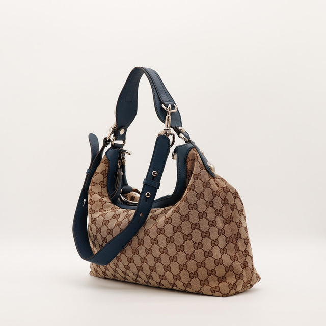 Hobo Gucci toile monogrammée vue de trois quarts arrière bandoulière réglable — AMANA Vintage