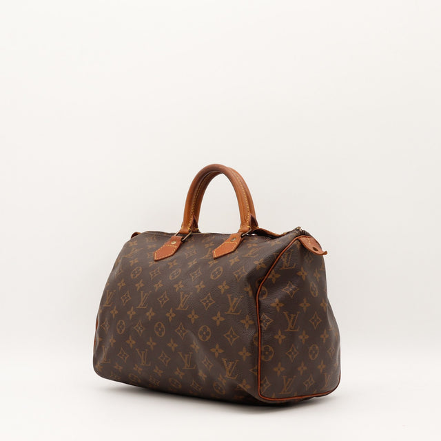 Détail cuir vachette patine sombre Louis Vuitton Speedy 30 occasion authentique — AMANA Vintage
