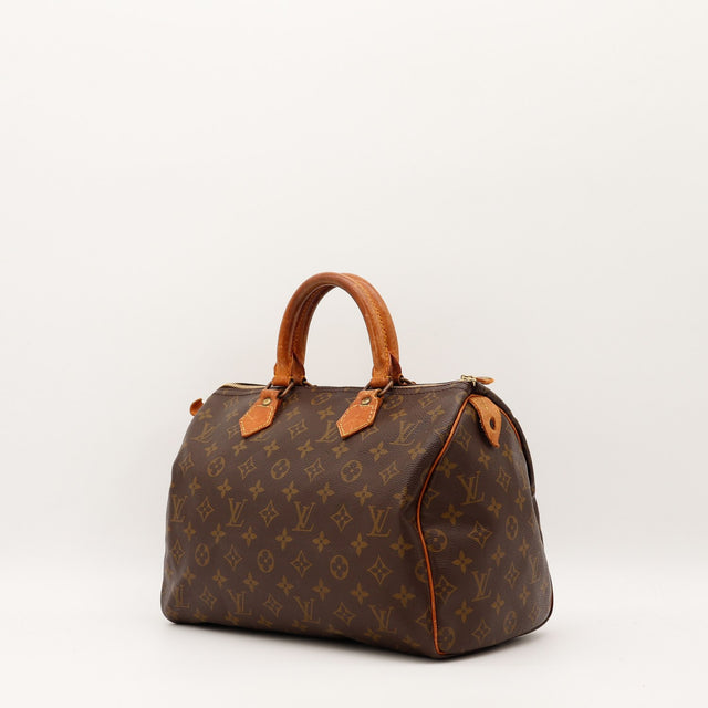 Détail cuir vachette patine caramel Louis Vuitton Speedy 30 — AMANA Vintage