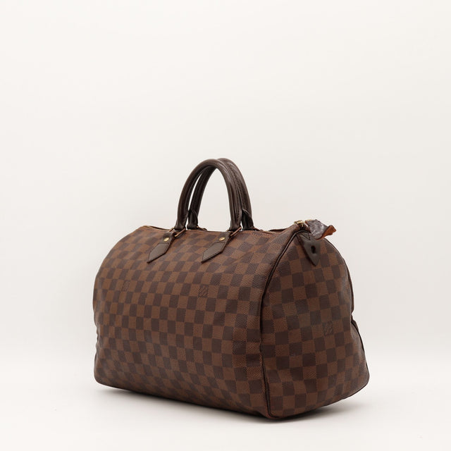 Détail anses cuir Louis Vuitton Speedy 35 Damier Ébène occasion authentique — AMANA Vintage