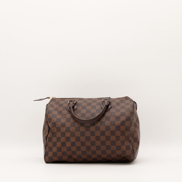 Détail tirette cuir et fermeture éclair Louis Vuitton Speedy 30 — AMANA Vintage