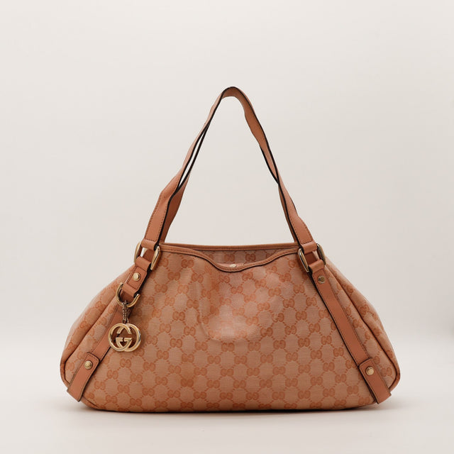 Sac Gucci Hobo toile monogrammée rose poudré vue de face occasion authentique — AMANA Vintage
