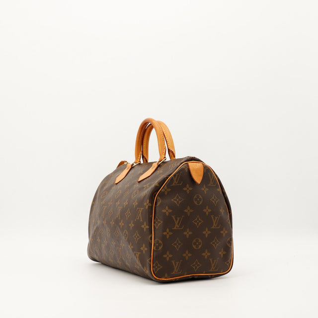 Detail coin inferieur Louis Vuitton Speedy 30 legers frottements — AMANA Vintage