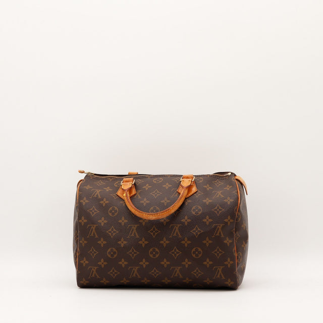 Détail coins cuir vachette Louis Vuitton Speedy 30 occasion authentique — AMANA Vintage