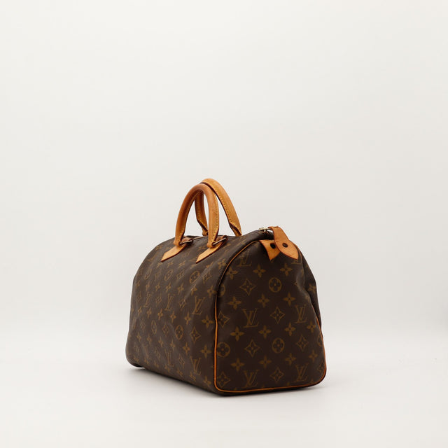 Louis Vuitton Speedy 30 vue de profil droit anses vachette patine caramel — AMANA Vintage