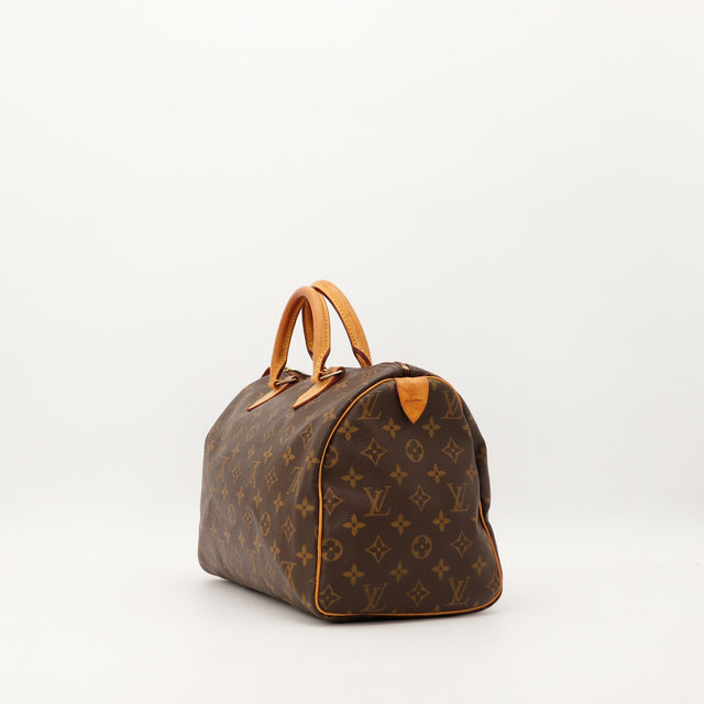 Louis Vuitton Speedy 30 vue de profil droit cuir vachette patine — AMANA Vintage