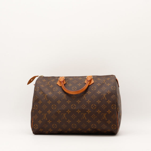 Coins cuir vachette Louis Vuitton Speedy 35 frottements occasion authentique — AMANA Vintage