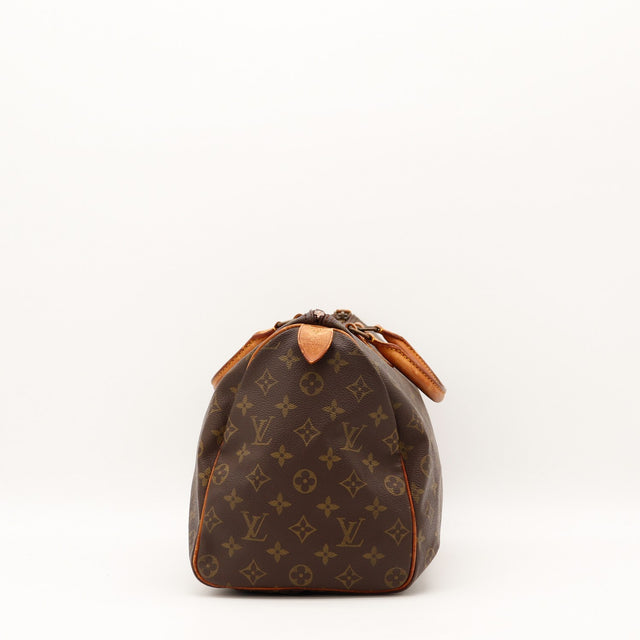 Detail tirette cuir Louis Vuitton Speedy 35 Monogram occasion authentique — AMANA Vintage