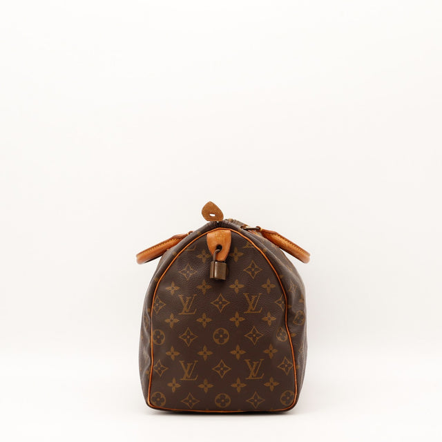 Détail anses patinées Louis Vuitton Speedy 35 toile Monogram occasion authentique — AMANA Vintage