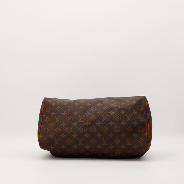 Detail interieur Louis Vuitton Speedy 35 languette rivet vachette — AMANA Vintage