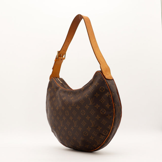 Vue de trois quarts Louis Vuitton Croissant MM anse vachette caramel — AMANA Vintage