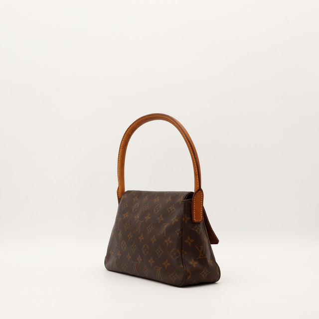 Louis Vuitton Looping vue de trois quarts droite anse vachette — AMANA Vintage