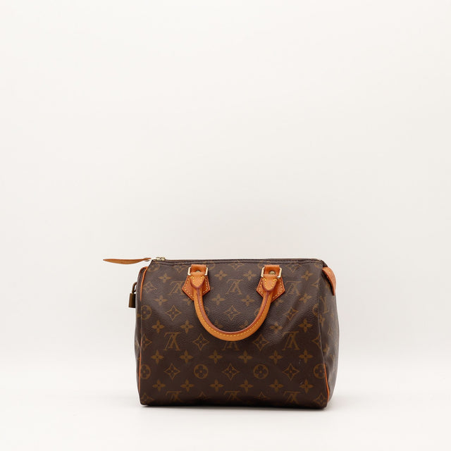Détail anses cuir vachette patine caramel Louis Vuitton Speedy 25 — AMANA Vintage