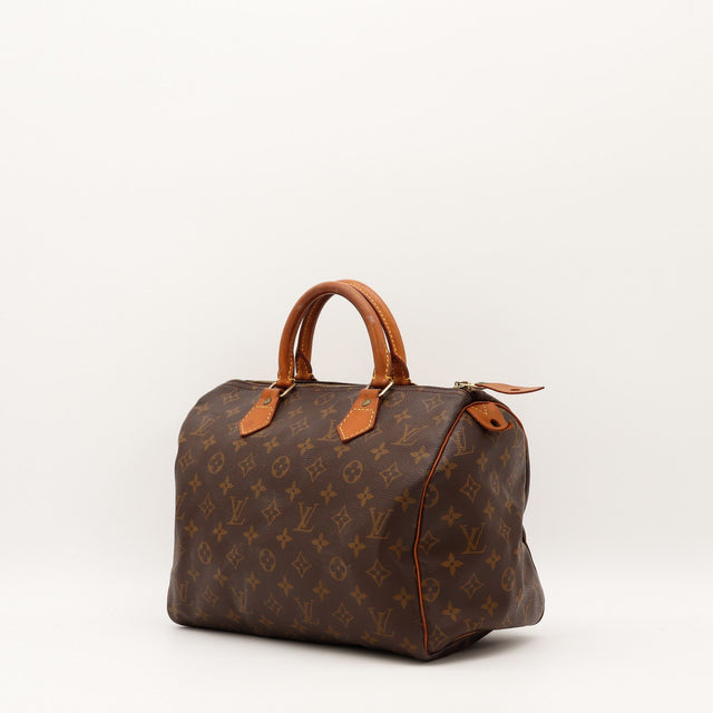 Détail cuir vachette patine caramel Louis Vuitton Speedy 30 occasion authentique — AMANA Vintage