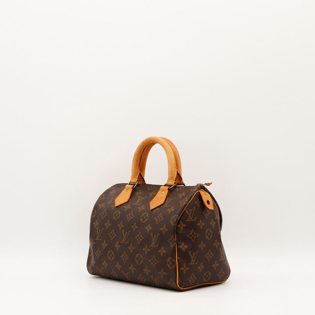 Detail cuir vachette patine caramel Louis Vuitton Speedy 25 occasion authentique — AMANA Vintage