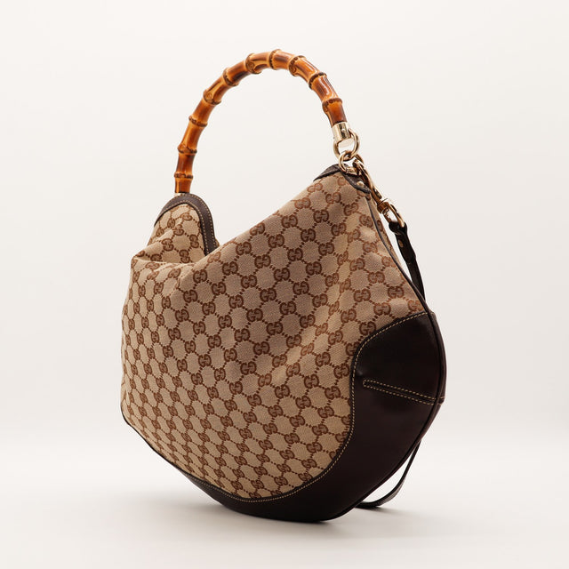 Gucci Hobo Bambou vue côté gauche détail cuir marron et bandoulière — AMANA Vintage