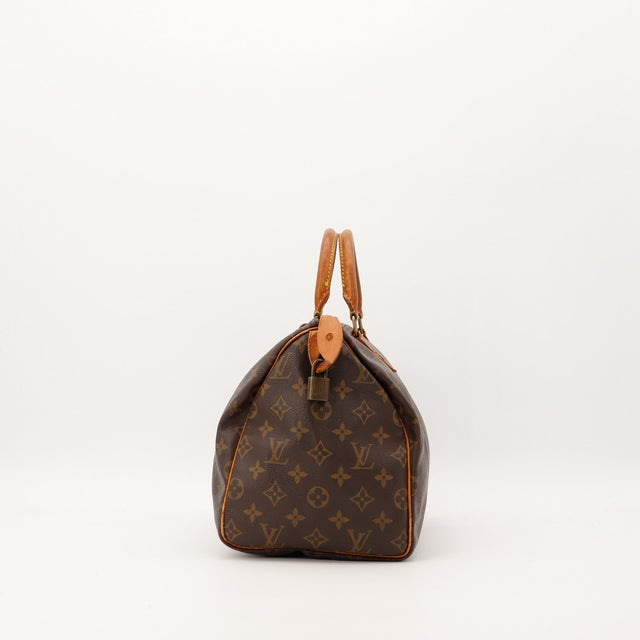Louis Vuitton Speedy 30 vue de profil droit toile Monogram patine caramel — AMANA Vintage