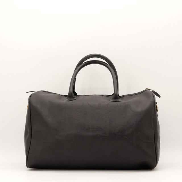 Détail anses cuir noir Christian Dior Boston occasion authentique — AMANA Vintage