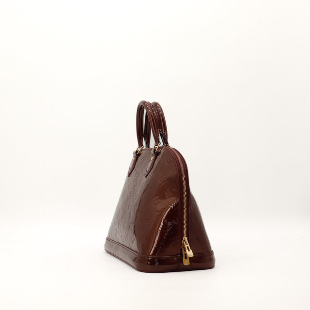 Vue de profil gauche Louis Vuitton Alma PM Vernis Amarante — AMANA Vintage