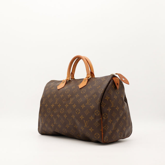 Louis Vuitton Speedy 35 vue trois quarts toile Monogram anses vachette — AMANA Vintage