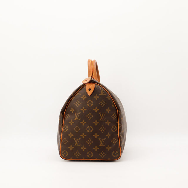 Profil gauche Louis Vuitton Speedy 40 toile Monogram patine caramel — AMANA Vintage