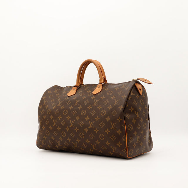 Vue trois quarts Louis Vuitton Speedy 40 toile Monogram anses vachette — AMANA Vintage
