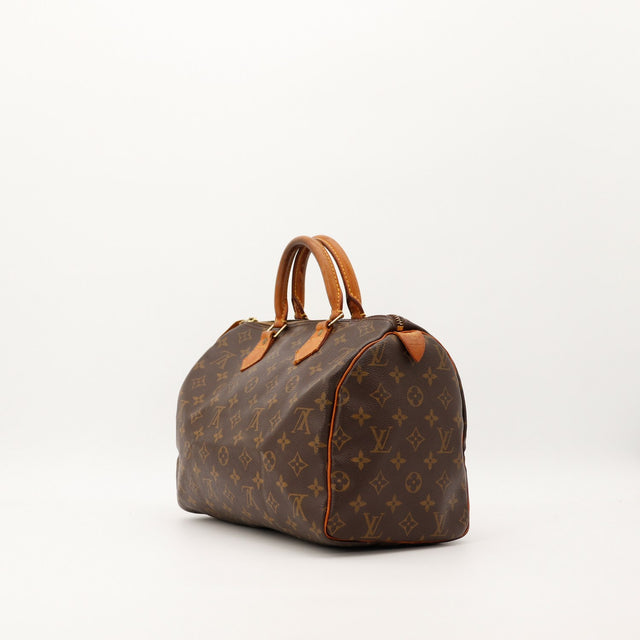 Vue trois quarts arriere Louis Vuitton Speedy 30 toile Monogram — AMANA Vintage
