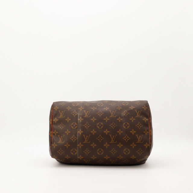 Detail coin inferieur Louis Vuitton Speedy 30 Monogram legers frottements — AMANA Vintage