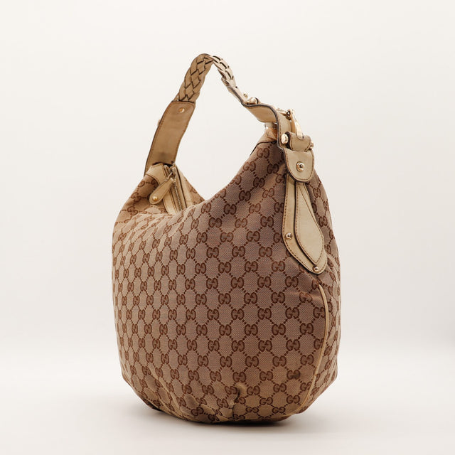 Hobo Gucci vue de trois quarts gauche toile monogrammée beige ivoire — AMANA Vintage